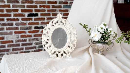 Vintage iron ornate wall mirror